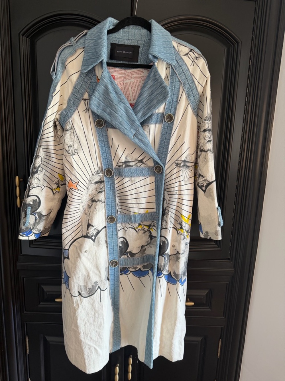 Artful White Trench Coat with Light Blue Trim